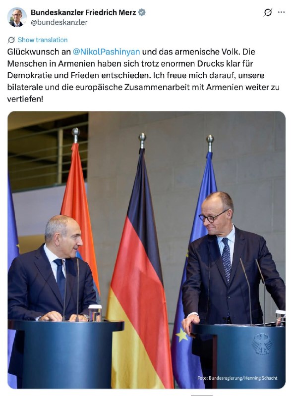 Фридрих Мерц и Никол Пашинян на фоне флагов Германии и Армении